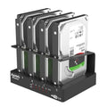K305BU3S four-bay external hard drive docking station for 2.5-inch SATA drives with cables and accessories
