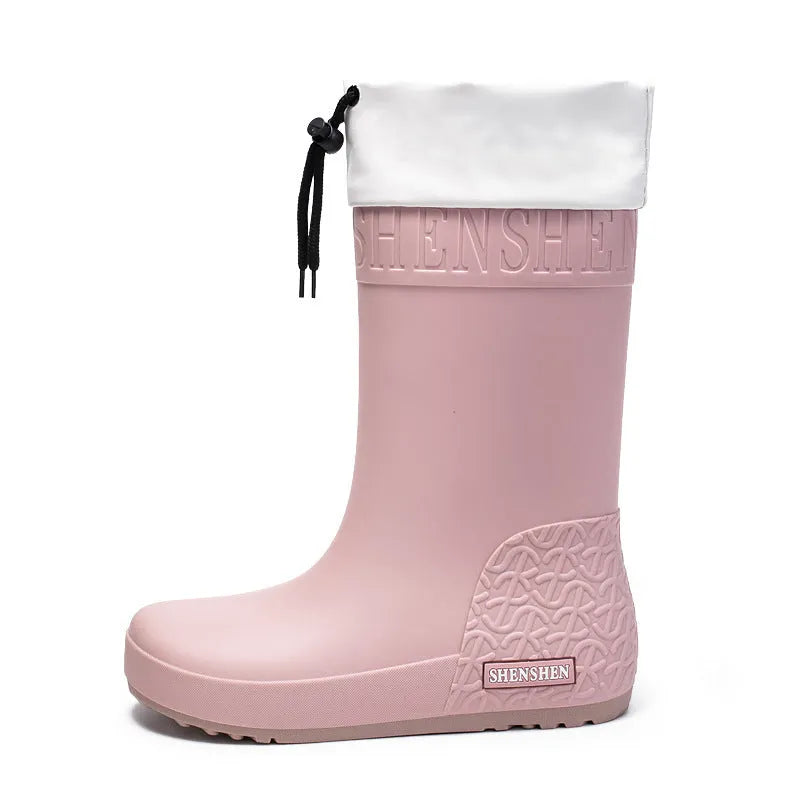 Women's solid-colour PVC rain boots with non-slip sole in apricot, black, brown, and pink