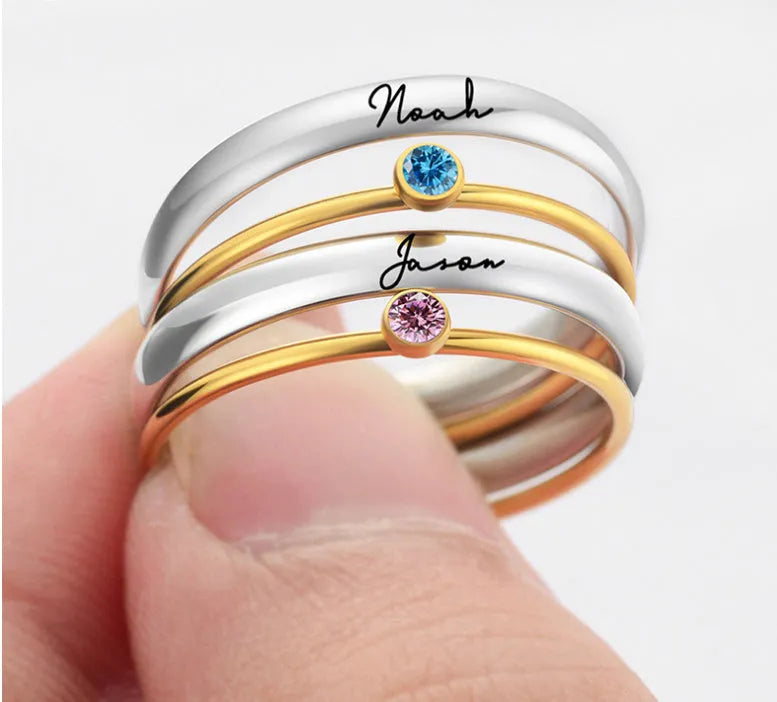 December colour birthstone engraved titanium steel ring with geometric shape on a plain background