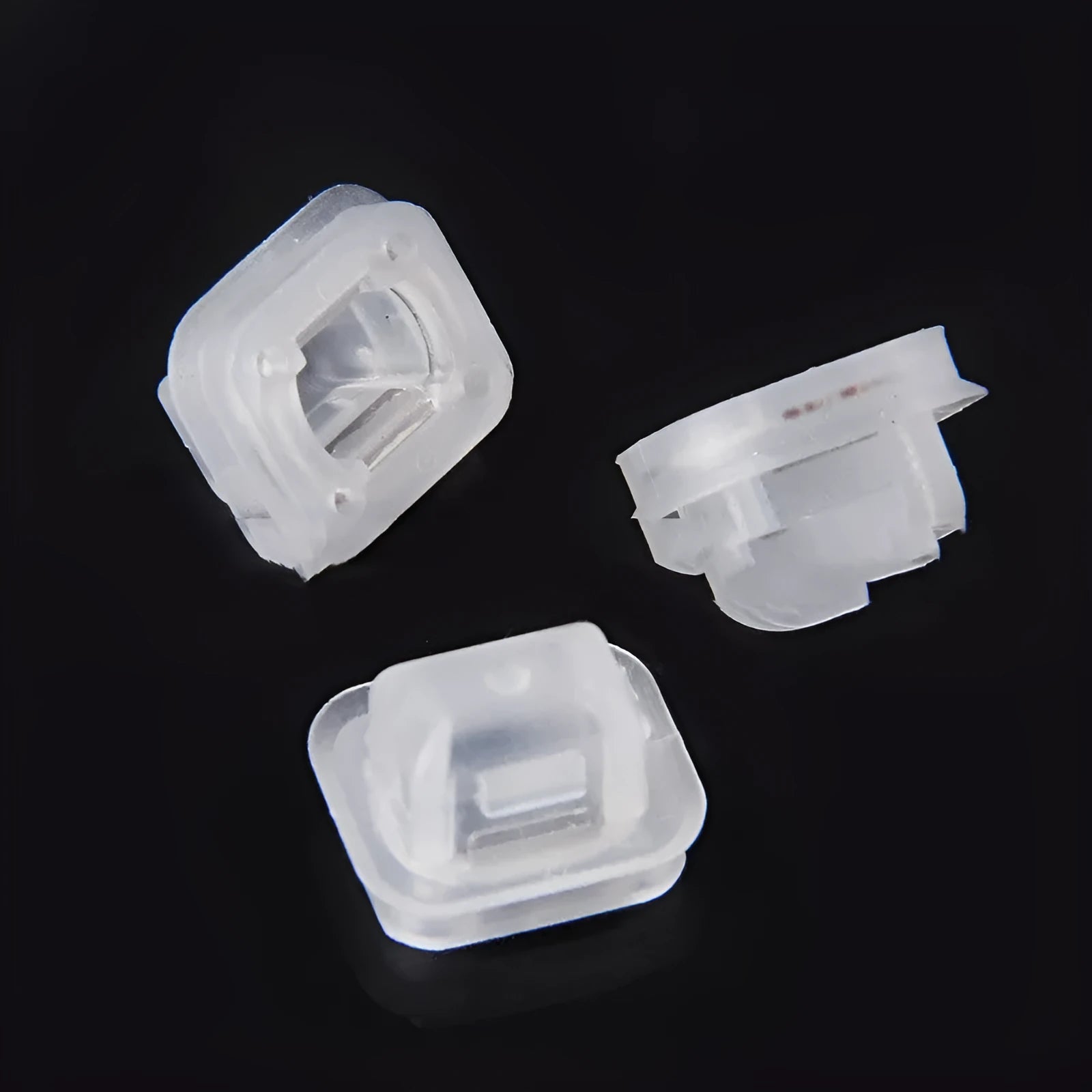 BMW E39 E38 seat clip fasteners in peach wood colour, 100-piece pack showing plastic and metal construction
