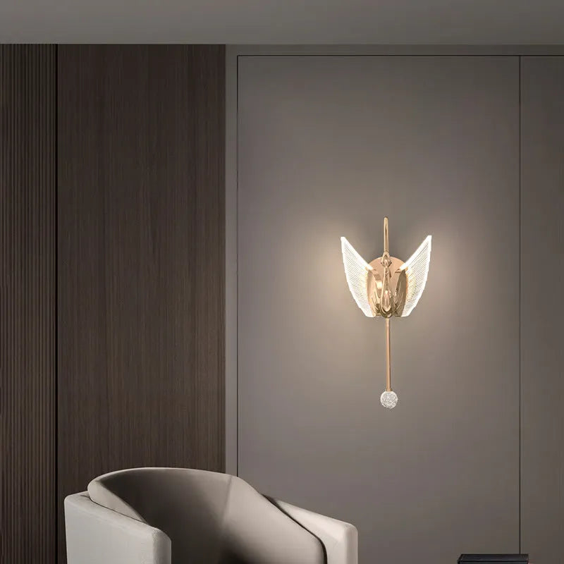 Gold modern minimalist swan LED wall lamp with acrylic shade offering tricolor dimming