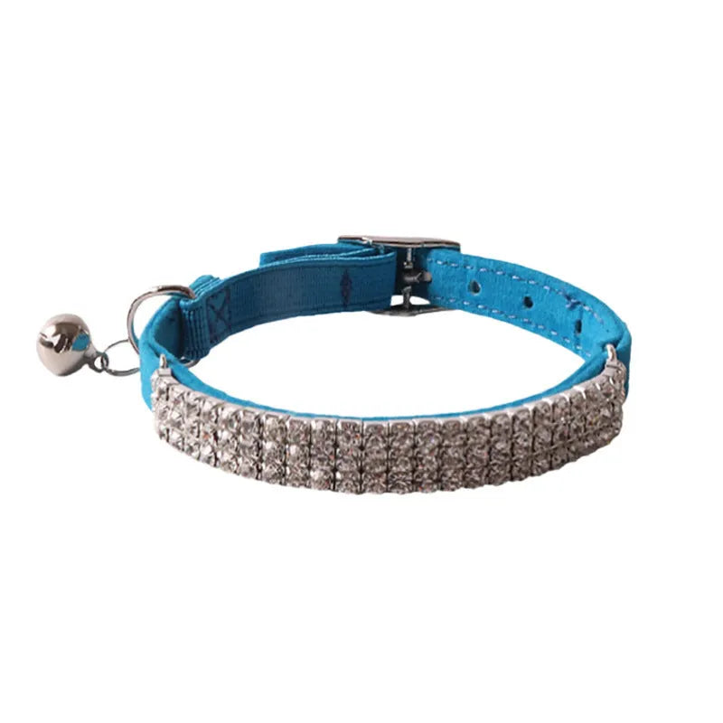 Flocking cat collar with elastic buckle in assorted colours on a white background.
