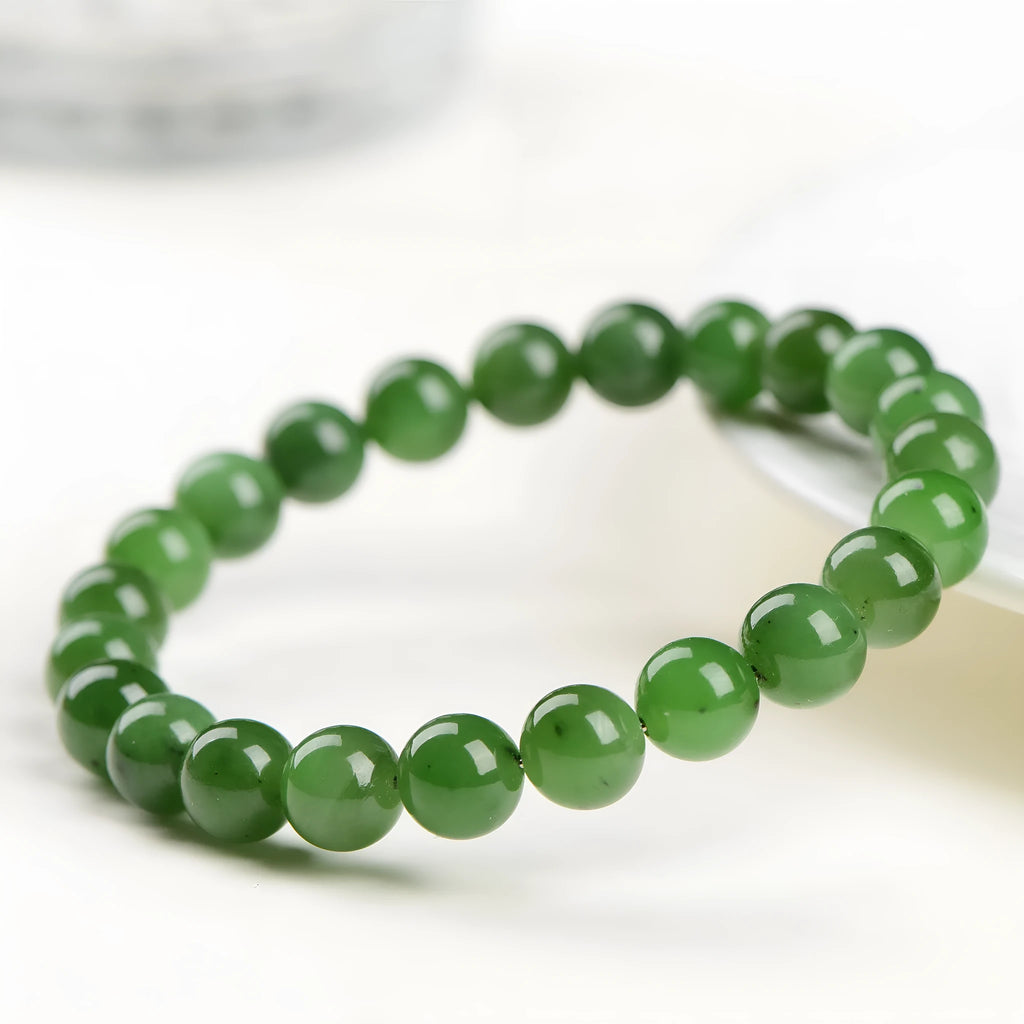 Natural jasper ball bracelet handcrafted from Hetian jade with polished stone beads