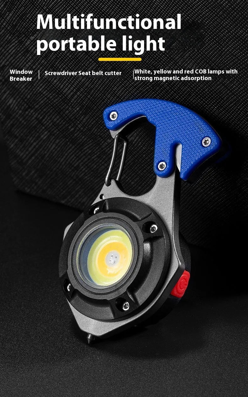 Compact silver and black multifunctional keychain flashlight with a window-breaking hammer tip and screwdriver.