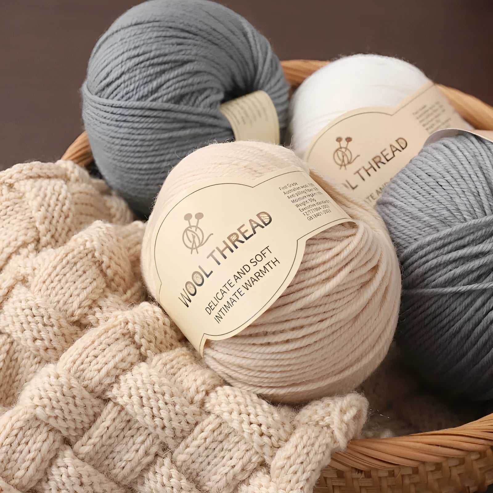 Roll of woolen hand knitting yarn in various colours including autumn fragrance green and bright red