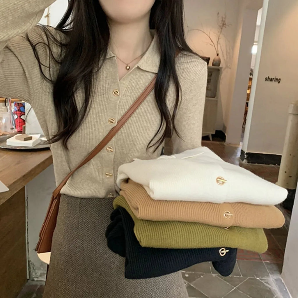 Women's beige loose-fit long-sleeved knitted cardigan top made from viscose fibre.