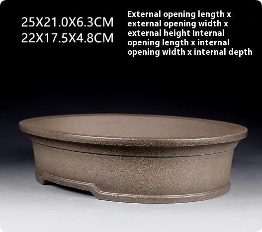 Handmade oval ceramic succulent pot with purple sand antique finish.