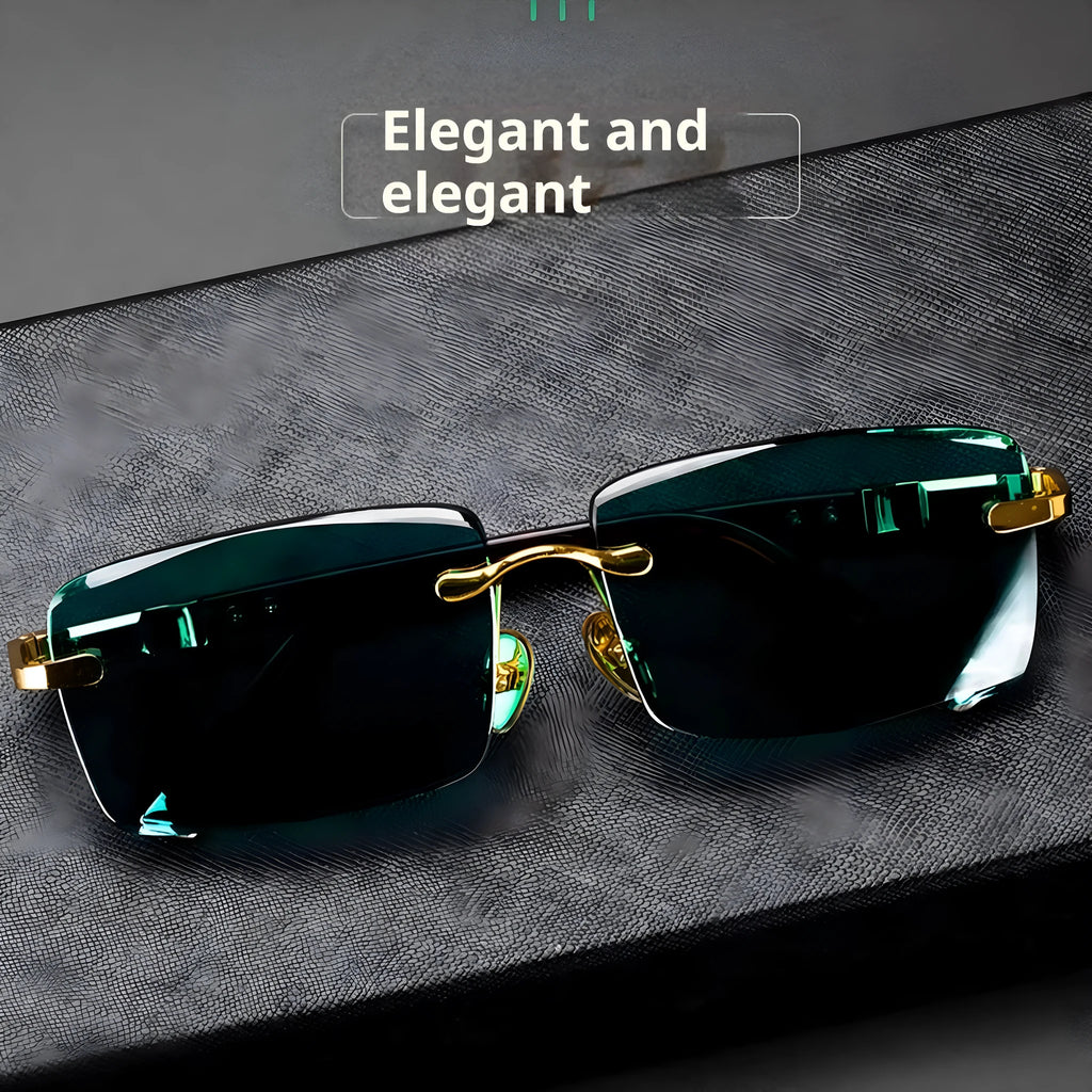 Dark green frameless crystal sunglasses inside a hard case with a cleaning cloth.