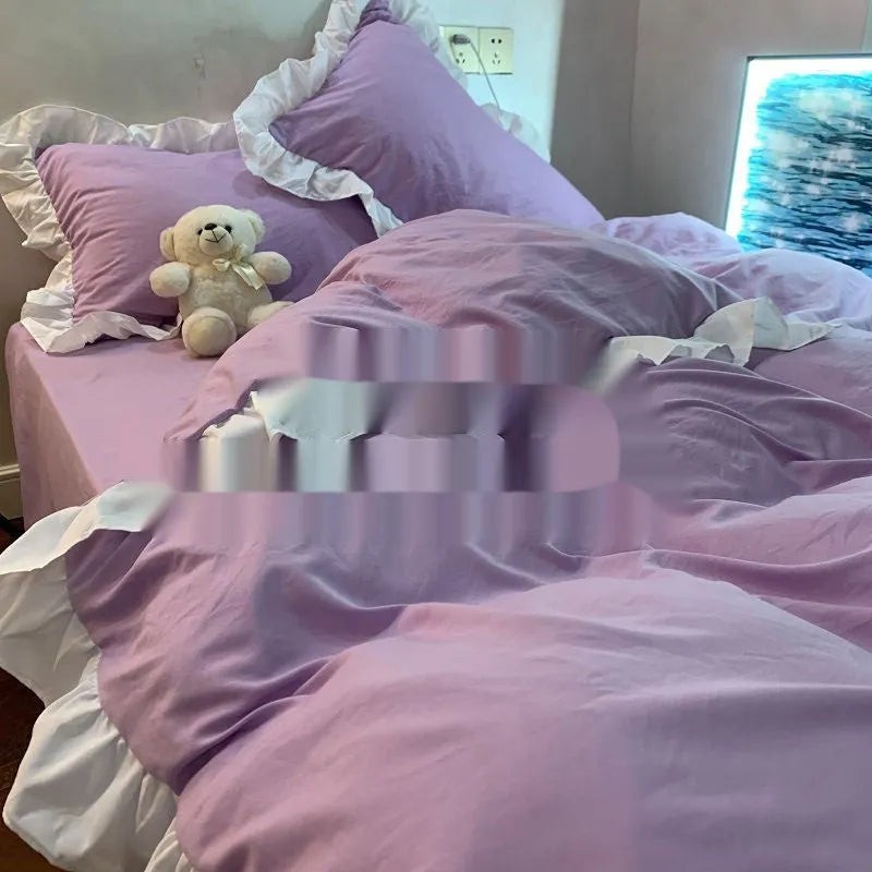 Mori style solid colour washed cotton bedding four-piece set with quilt cover on a bed.