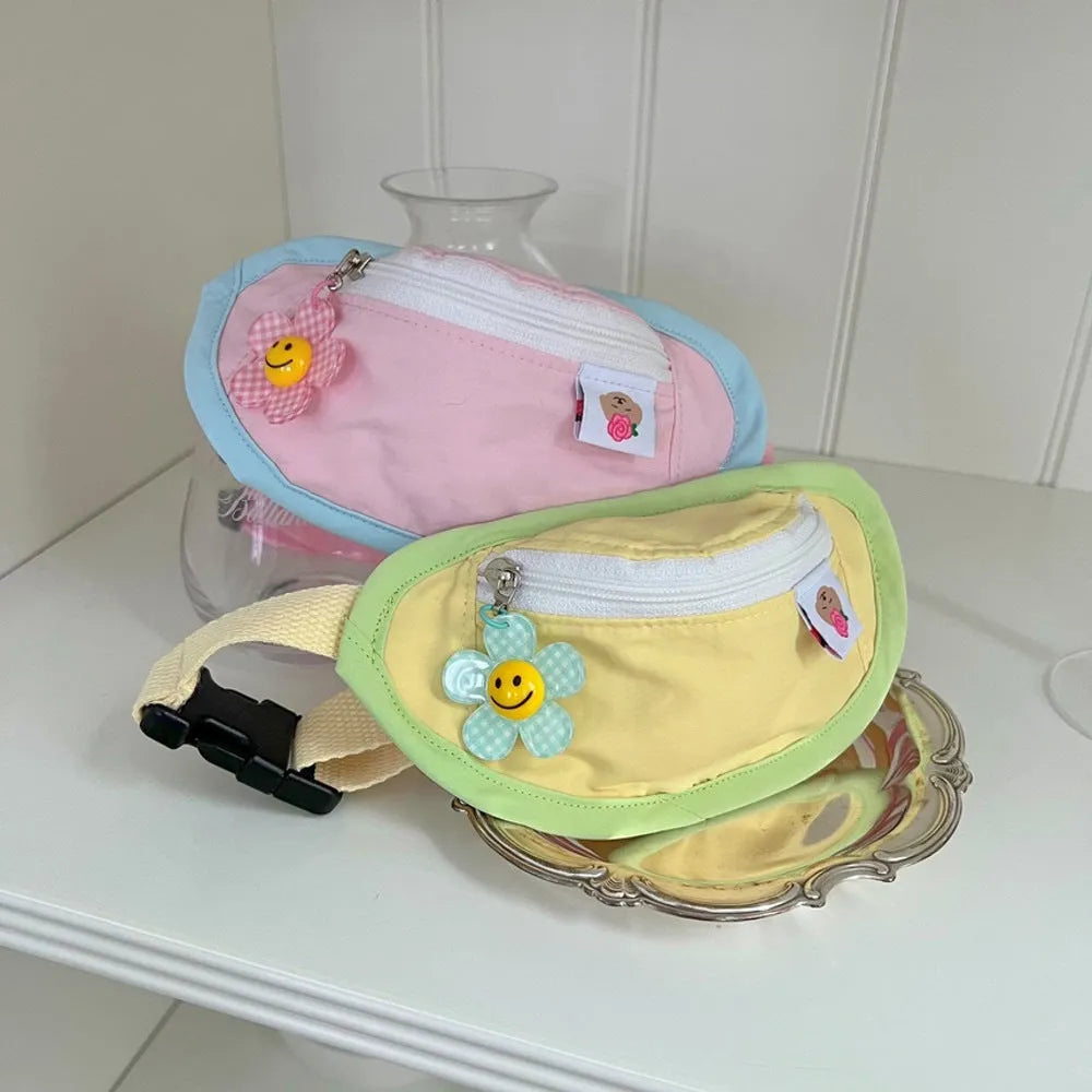 Powder blue, yellow, and green backpack-style messenger bag dog and cat carrier.