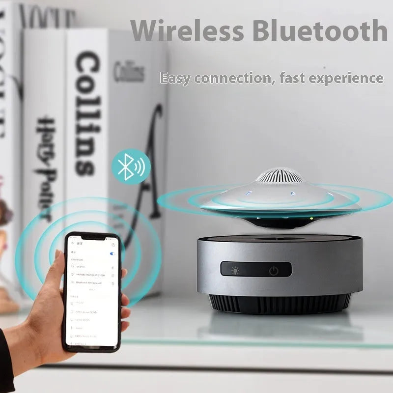 Automatic lifting magnetic levitation Bluetooth speaker floating above its base with injection-moulded ABS housing