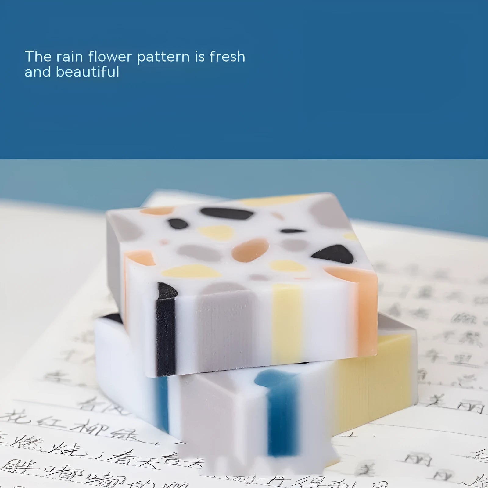 White rubber brick eraser for clean pencil mark removal.