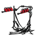 Black and red trunk-mounted bicycle carrier rack with tie ropes and protective sponge padding.