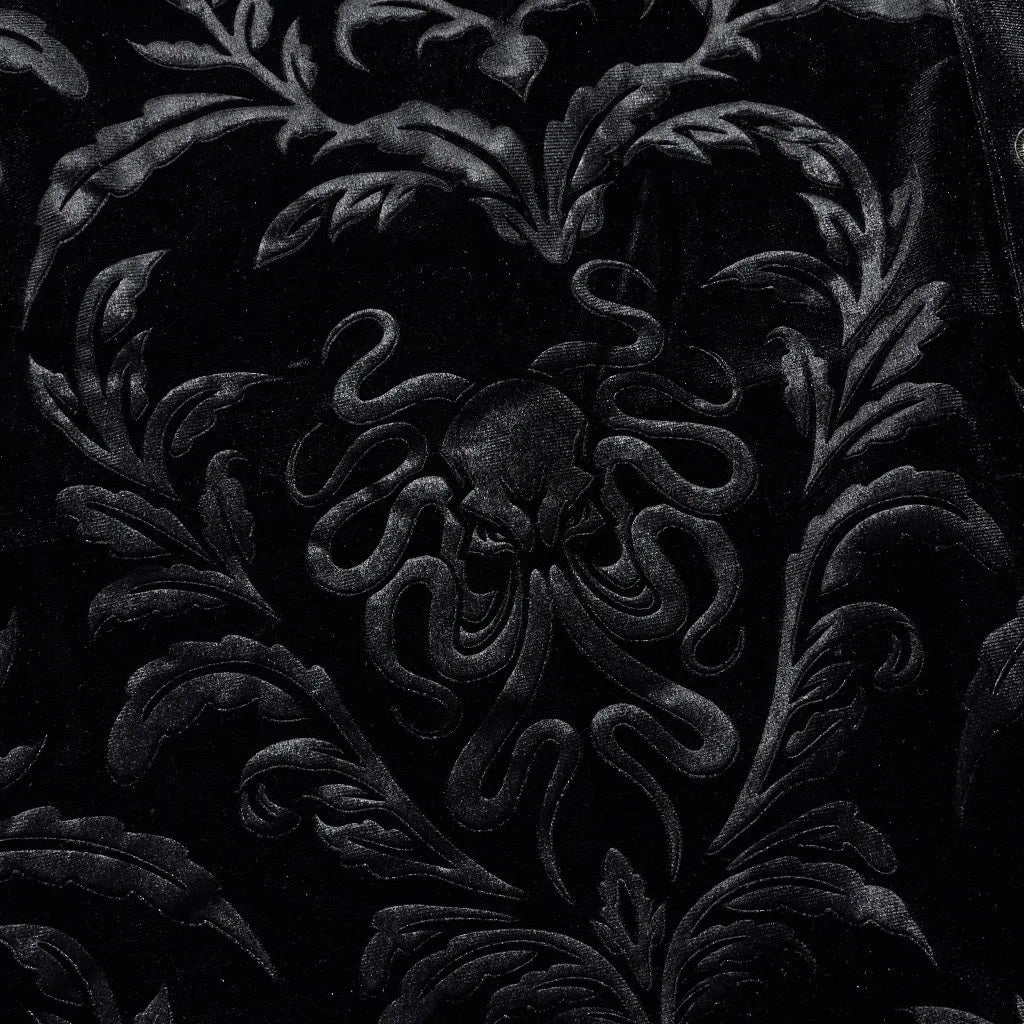 Black Gothic-style men's velvet shirt with a pointed collar and long sleeves on a hanger