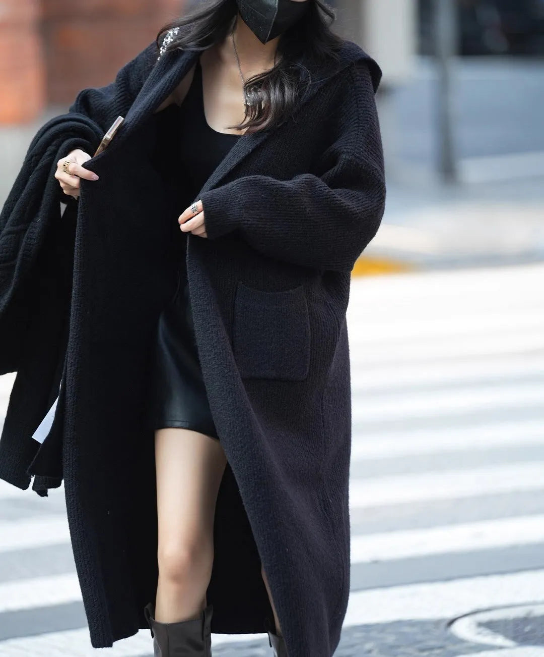 Long grey knitted hooded cardigan trench coat with loose fit and regular sleeves