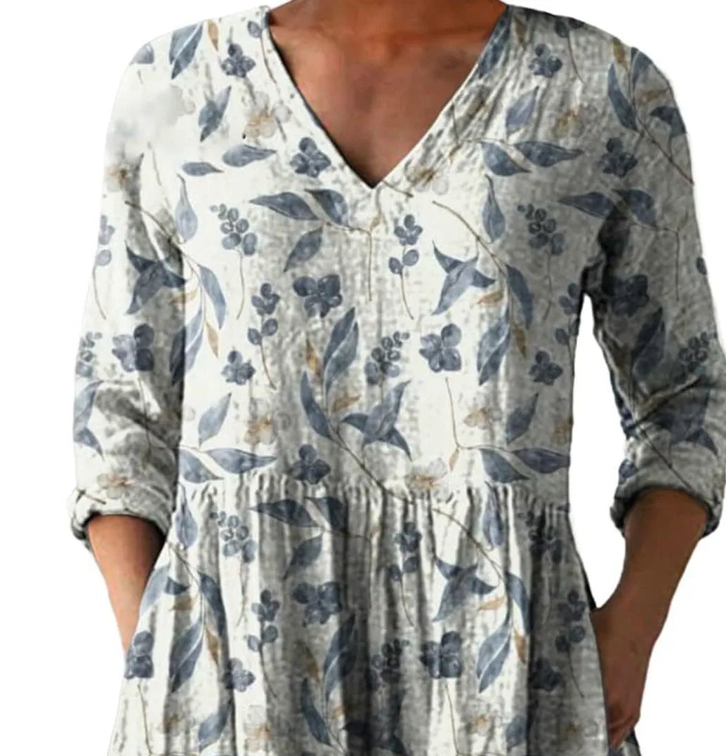 Women's printed loose dress with wave pattern, 3/4 sleeves, and wide waist design