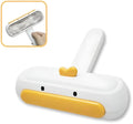 Portable pet hair brush with yellow duck design showing removable lid and polyester bristles