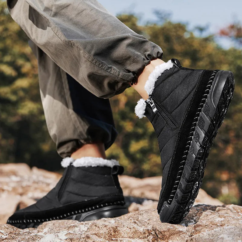 Men's plus size snow boots in black with round toe and flat heel design