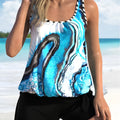 Blue tie-dyed floral women's two-piece swimsuit with shorts style bottom, plus sizes available