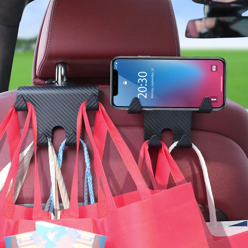 Black ABS plastic car hook with integrated mobile phone holder bracket for rear seat back.