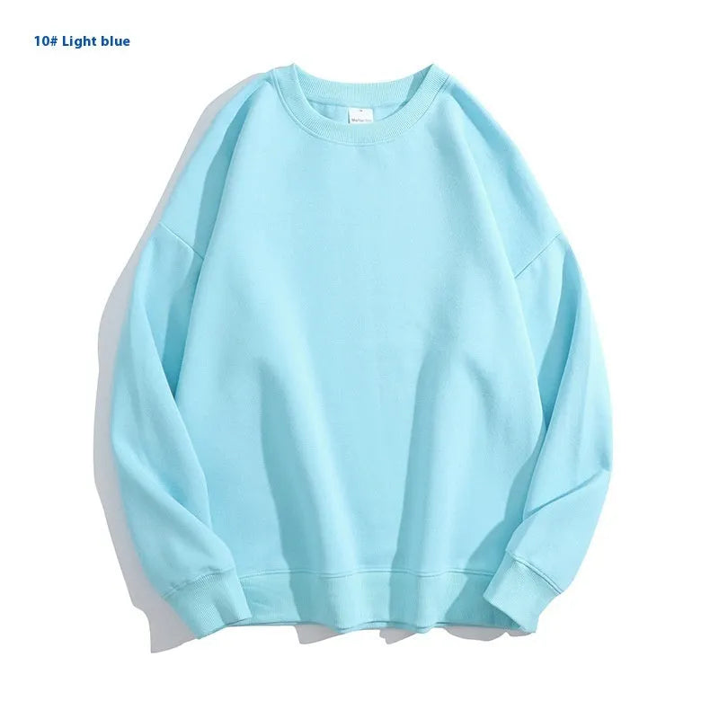 Women's loose fit off-the-shoulder cotton sweater in a solid colour, showing round neck and long sleeves.