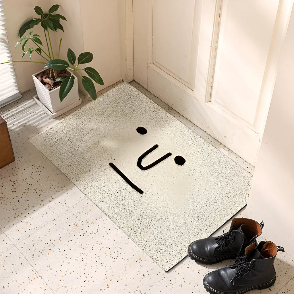 Square PVC floor mat with cartoon Mr Big Nose face and geometric pattern on a grey background.