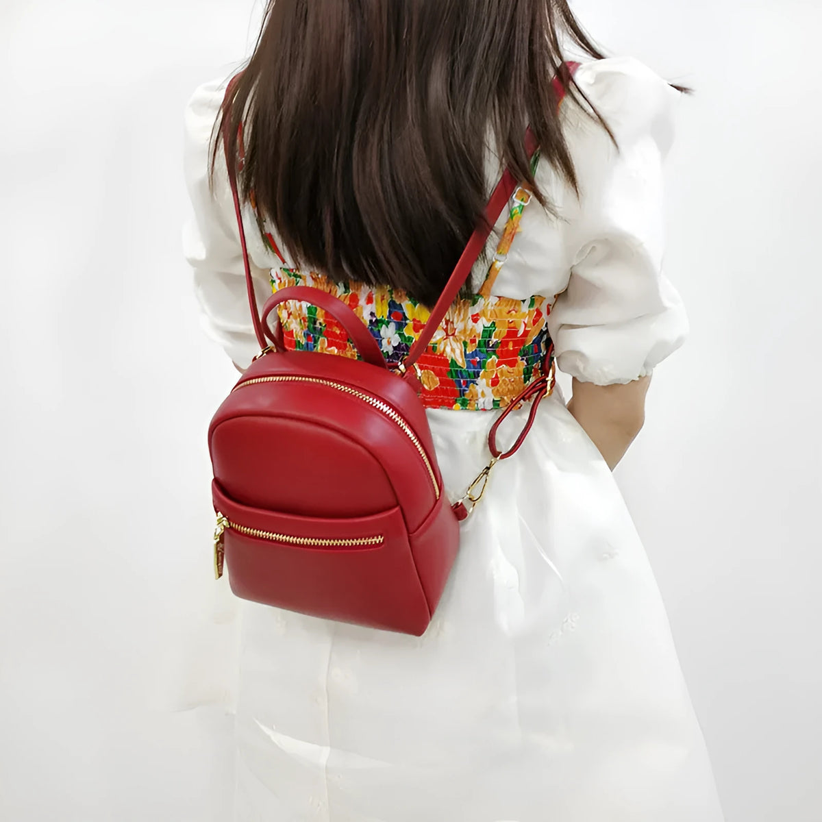 Soft PU mini backpack in street style with contrast colour detailing and three-dimensional pocket