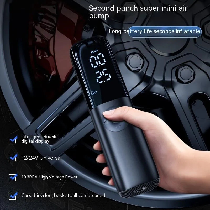 Black portable electric vehicle air pump with built-in pressure gauge and ABS inflation hose for 12V/24V car tyre inflation.