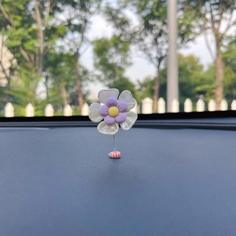 Plastic car swing decoration measuring 5cm tall in blue, green, pink, purple, or yellow