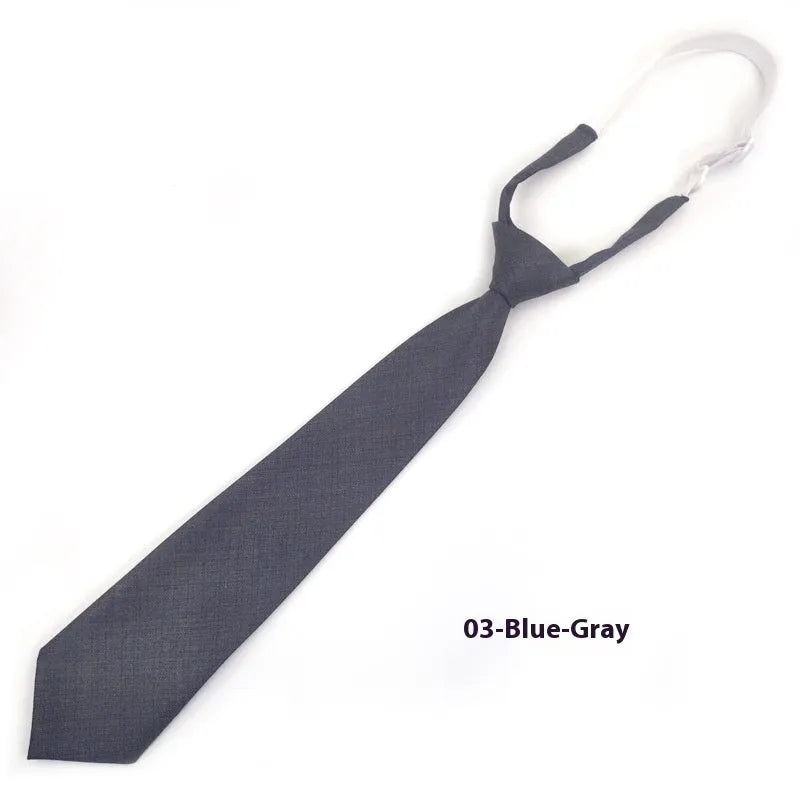 Navy blue cotton bow tie with arrow style shape measuring 35cm by 7cm