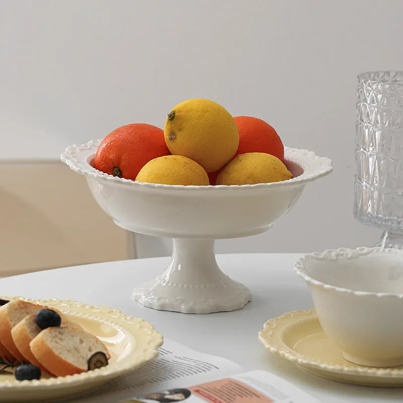 Vintage lace ceramic plate with irregular shape and coloured glaze in white or yellow