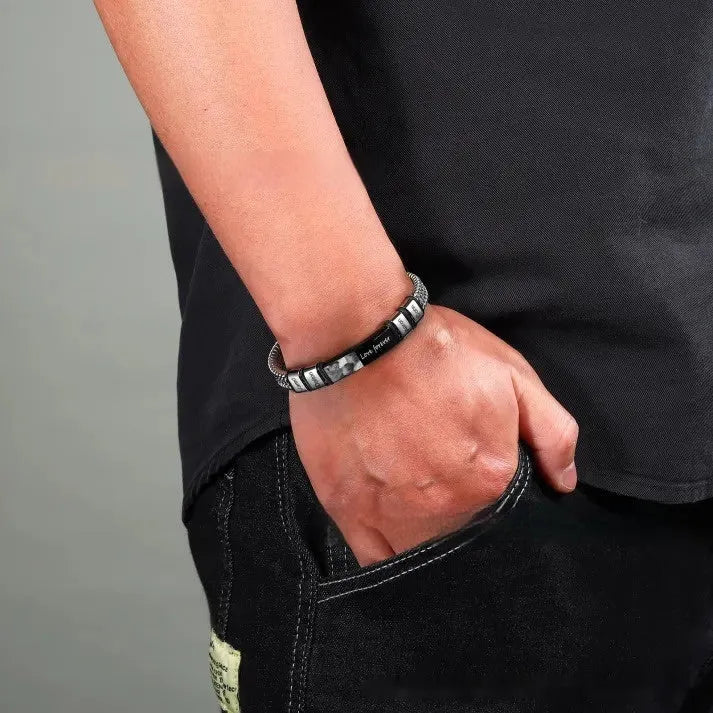 Men's titanium steel and leather rope bracelet with a heart-shaped lettering bead in a gift box.