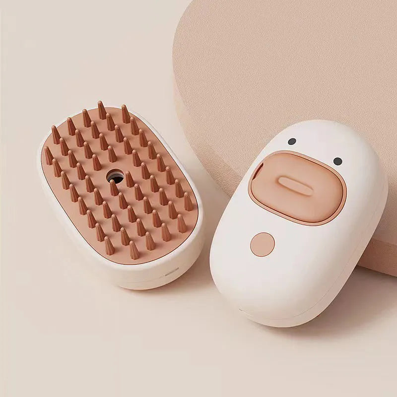 White rechargeable pet steam brush with silicone comb teeth for cat and dog grooming