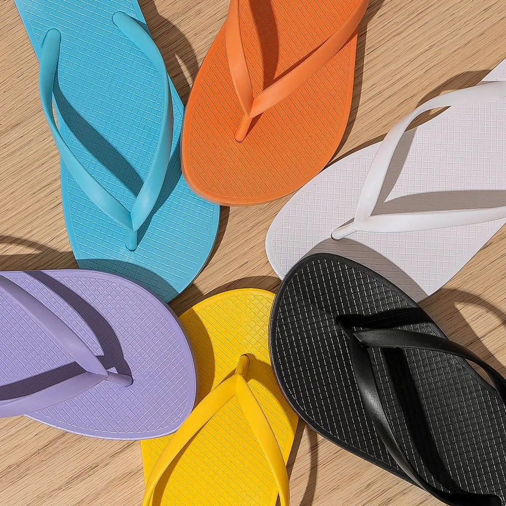 Foldable beach slippers with non-slip PVC sole and breathable hollow-out upper design
