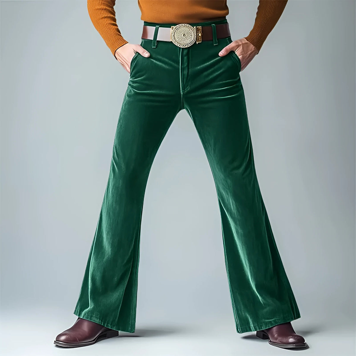 Man wearing gold velvet slim flared suit trousers in dark red for a formal banquet setting.