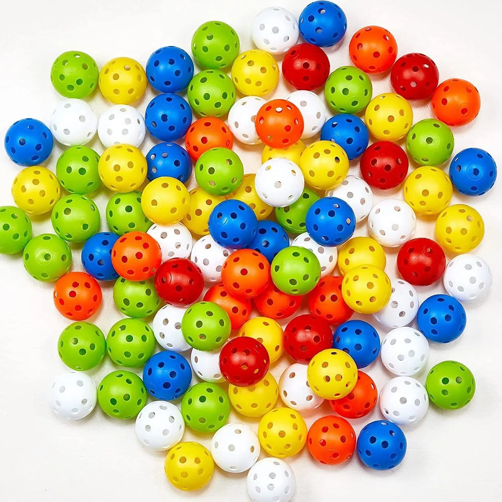 Multi-colour 42mm PE golf practice balls with 26-hole design in net pocket