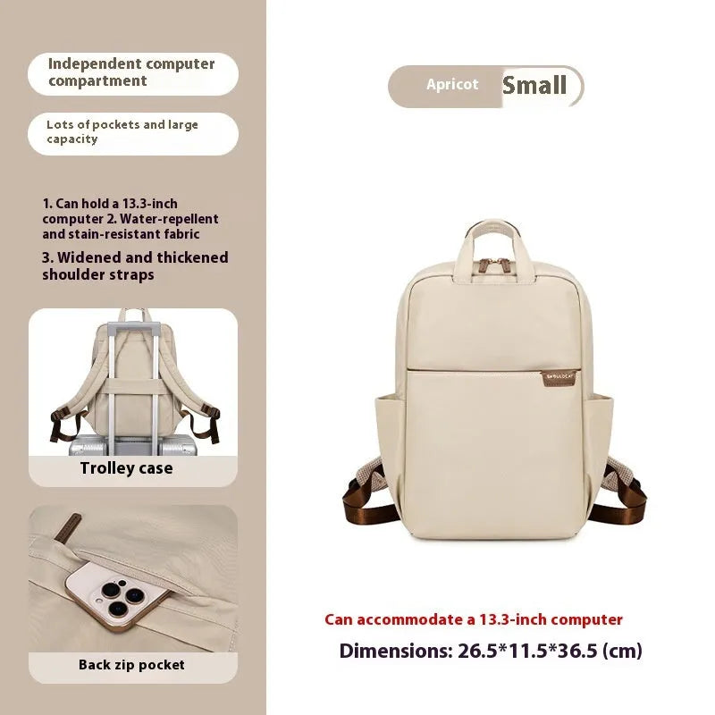 Large canvas women's backpack in apricot colour showing front view with multiple pockets and internal compartments open.