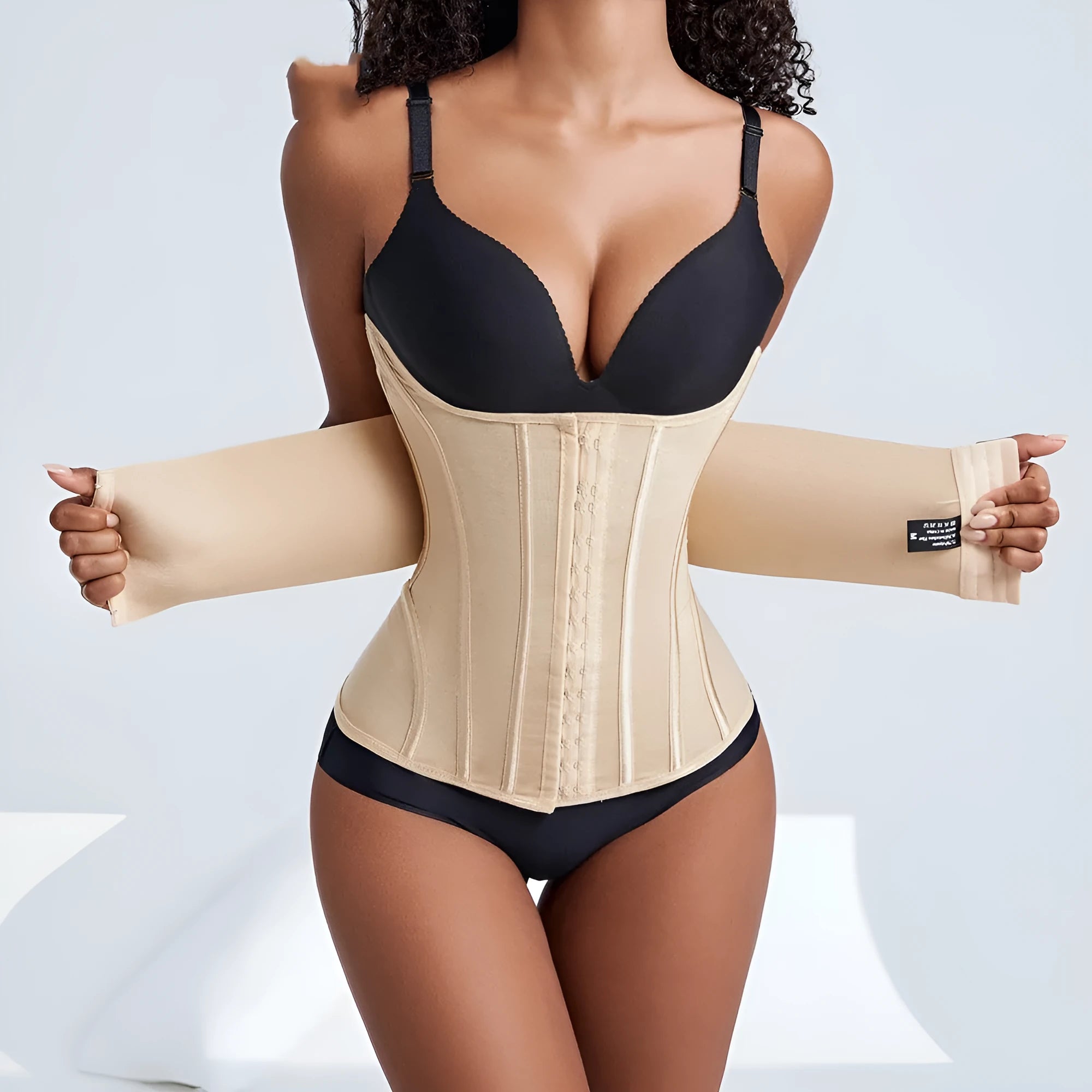 Nylon waist trainer belly band in black and apricot colours with belt tie