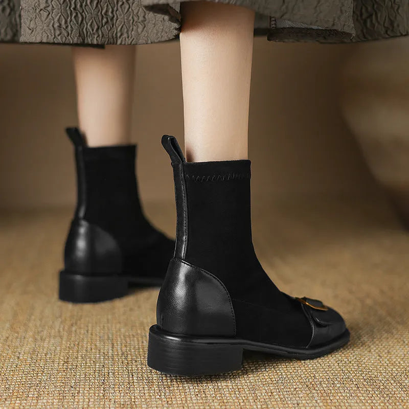 Women's black casual ankle boots with lace-up front and low rubber heel