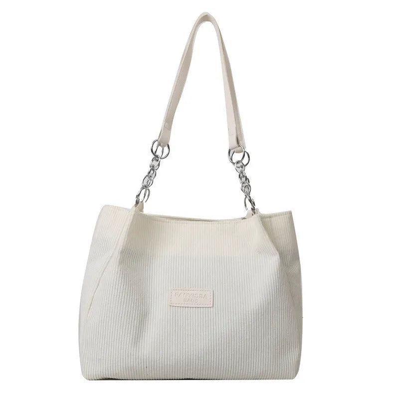 Corduroy one-shoulder tote handbag in street trend style with three-dimensional pocket