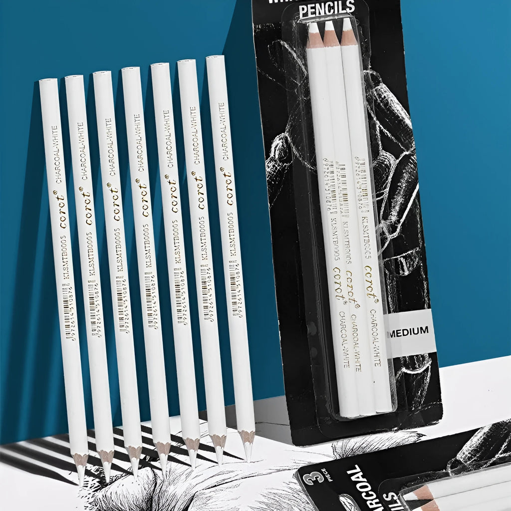 Set of three white charcoal pencils with wooden shells for highlighting and shading art on dark paper