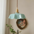 Medieval style brass flower bud chandelier with glass body, shown with adjustable height chain.