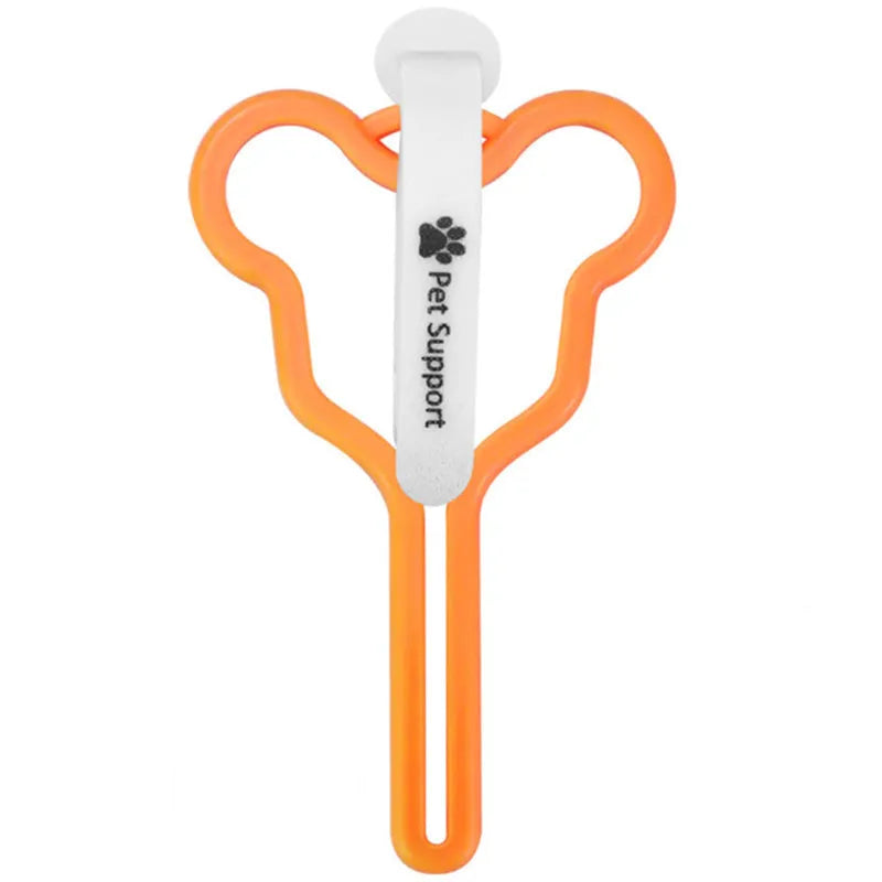 A dog poop bag holder with a Velcro strap, shown attached to a pet leash.