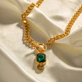 Gold electroplated titanium steel necklace with geometric round pendant and Cuban link chain