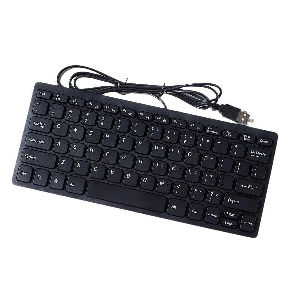 Compact wired USB keyboard in four colour options: black, white, pink, and blue