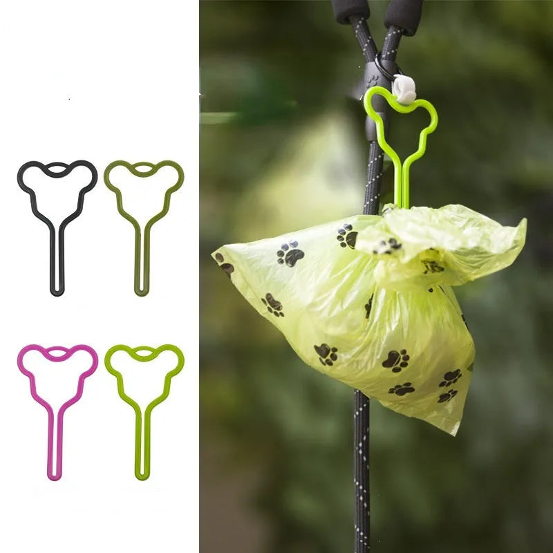 A dog poop bag holder with a Velcro strap, shown attached to a pet leash.
