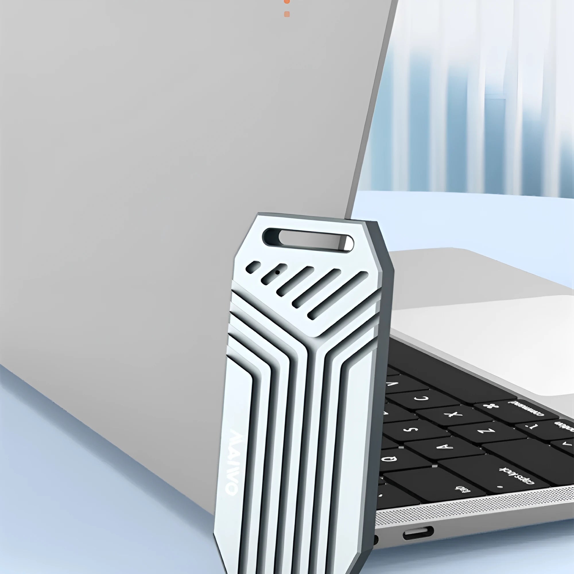 Silver aluminium external SSD enclosure for M.2 drives with Thunderbolt 4 and USB4 40Gbps connectivity.