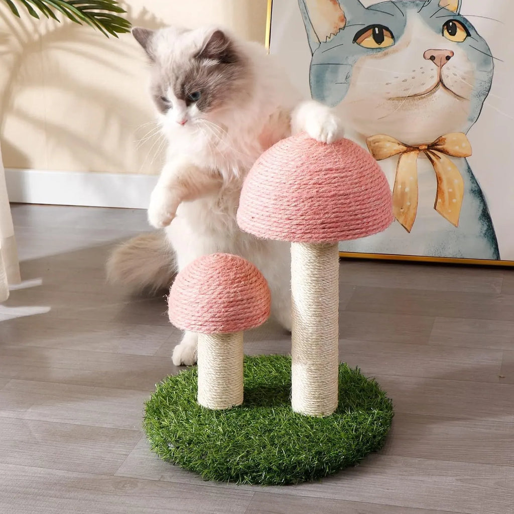 Pink mushroom-shaped cat scratching post with sisal fabric, for small cats and kittens.