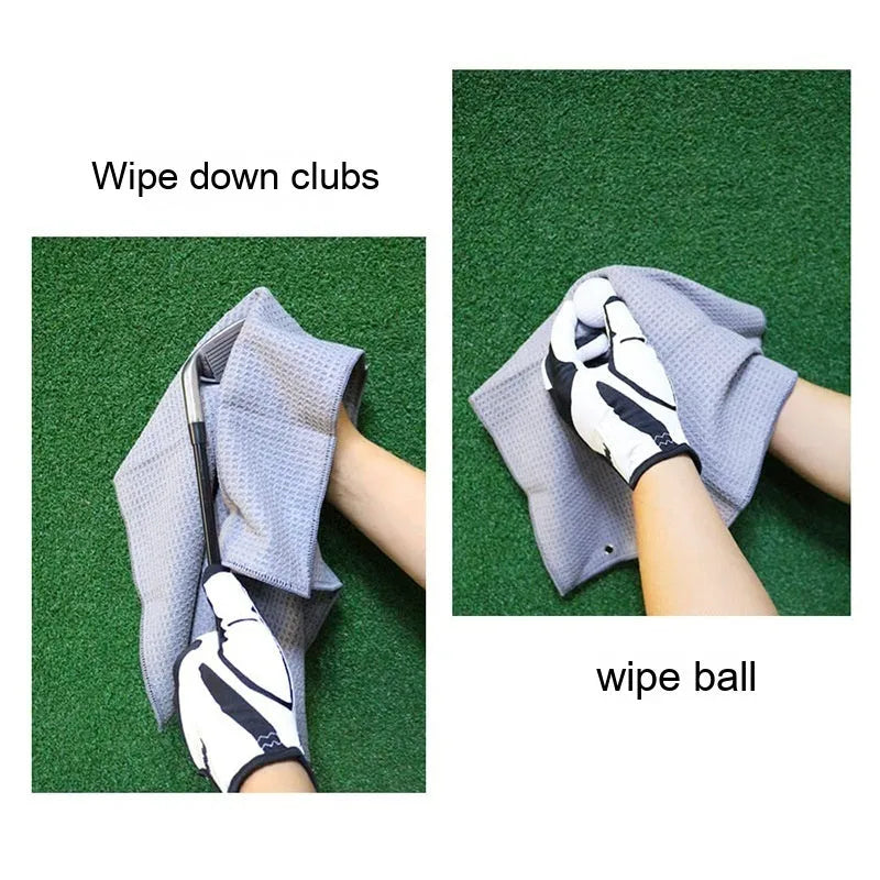 Waffle weave golf ball cleaning cloth in selected colour on a green.
