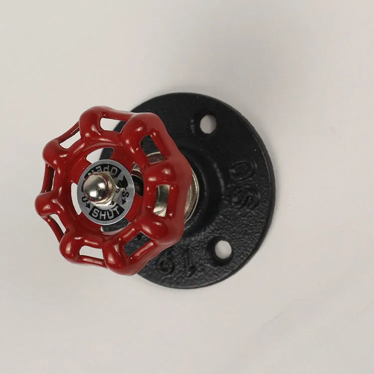 Metal wall hanging hook with water pipe design in choice of black, green, or red finish.